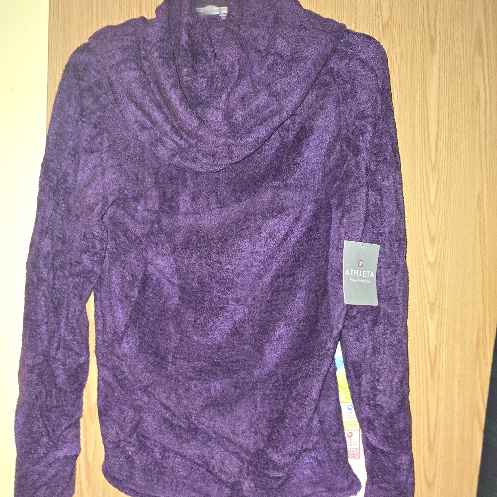 Soft turtle neck sweater from althleta new with tags